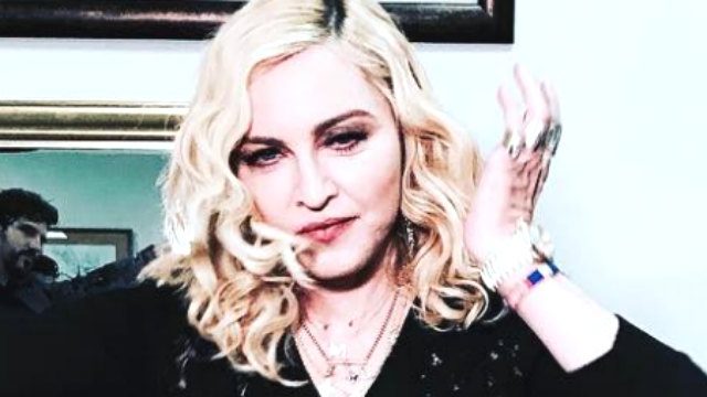 Judge halts auction after Madonna objections