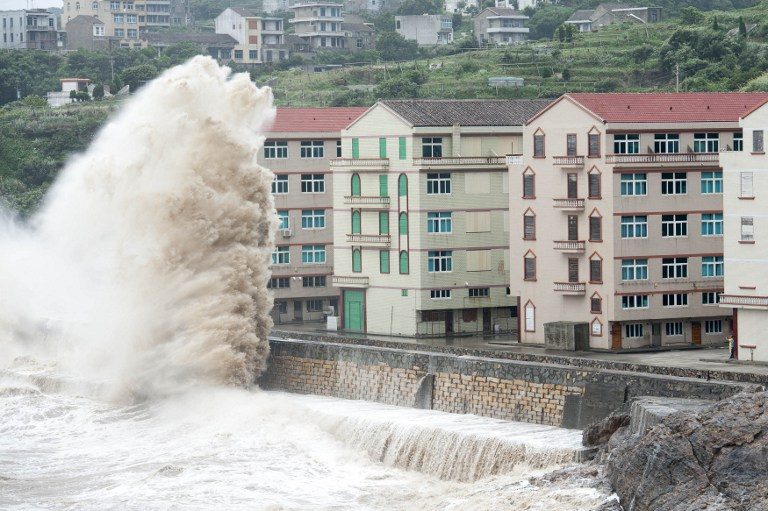 China evacuates over 865,000 as typhoon nears