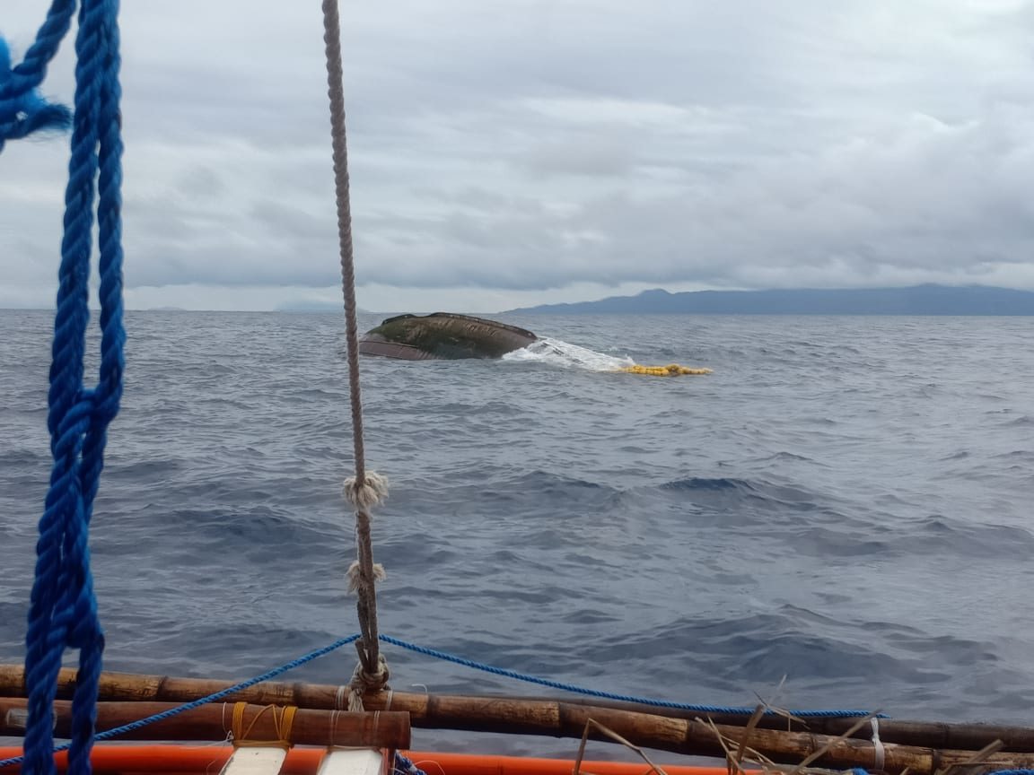 CAPSIZED. The upturned hull of the Philippine fishing boat Liberty 5 spotted on Sunday, June 28, after it collided with a Hong Kong-flagged cargo ship. Photo from the Philippine Coast Guard  