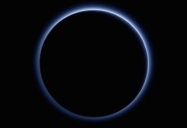 Blue skies, frozen water detected on Pluto