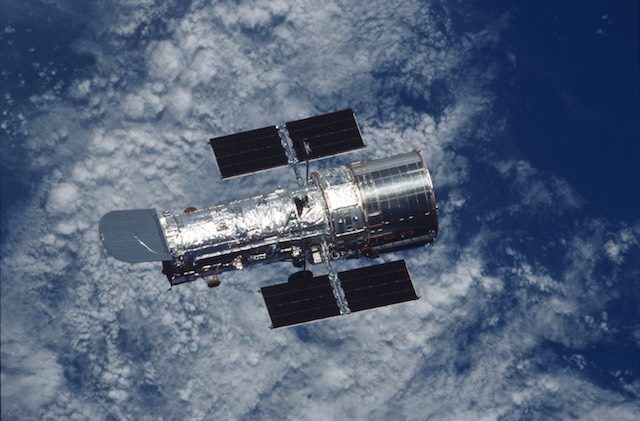 EYE IN THE SKY. The Hubble Space Telescope floats against the background of Earth after a week of repair and upgrade by Space Shuttle Columbia astronauts in 2002. Image courtesy NASA/ Hubble Site  