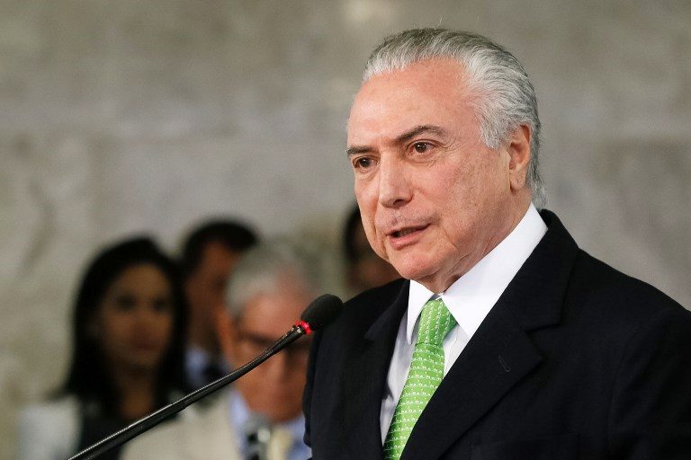 Brazil’s election court votes not to oust Temer