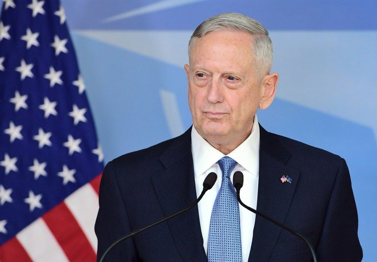 Pentagon chief lets transgender troops remain in service