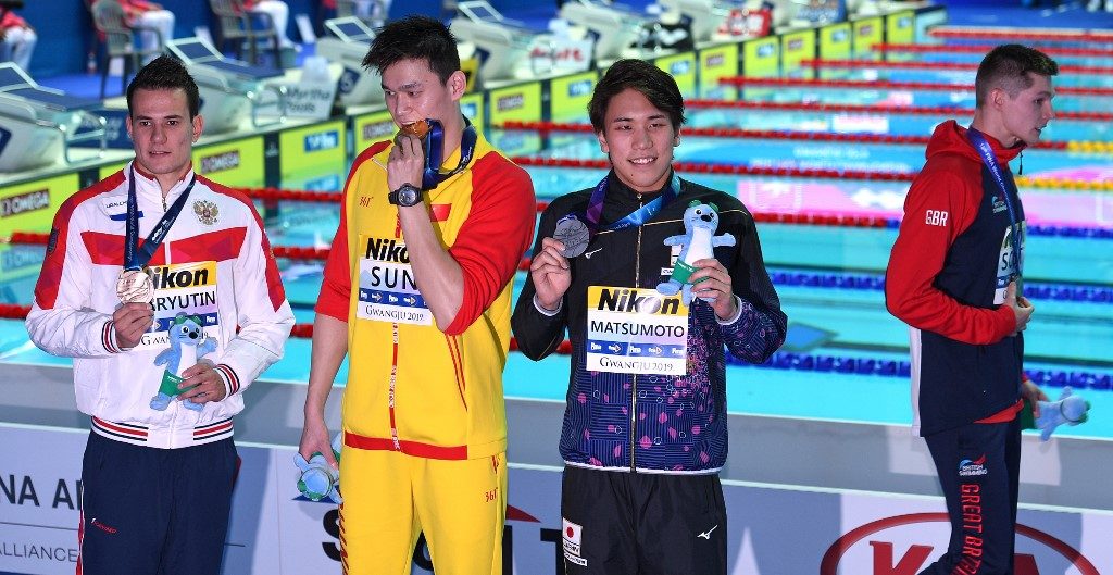 Sun, Scott warned by FINA over world swim medal clash