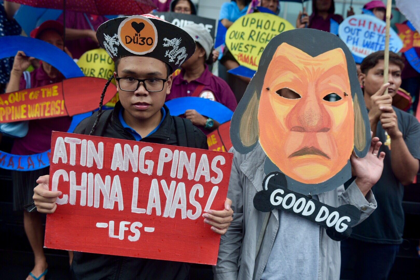 LAPDOG. Protesters portray President Duterte as China's lapdog for his tolerance of China's incursions in the disputed West Philippine Sea. 