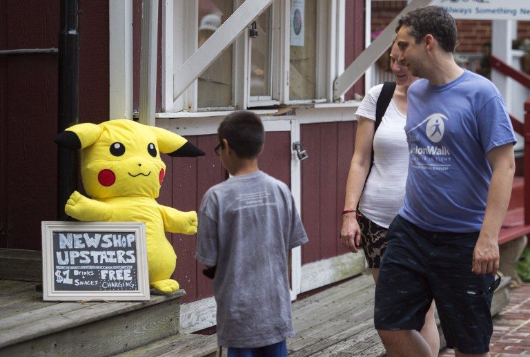 MASCOT APPEAL. In  Virginia, US the iconic Pikachu stands guard in front of a shop, attracting passersby. Photo by Paul J. Richards/AFP   