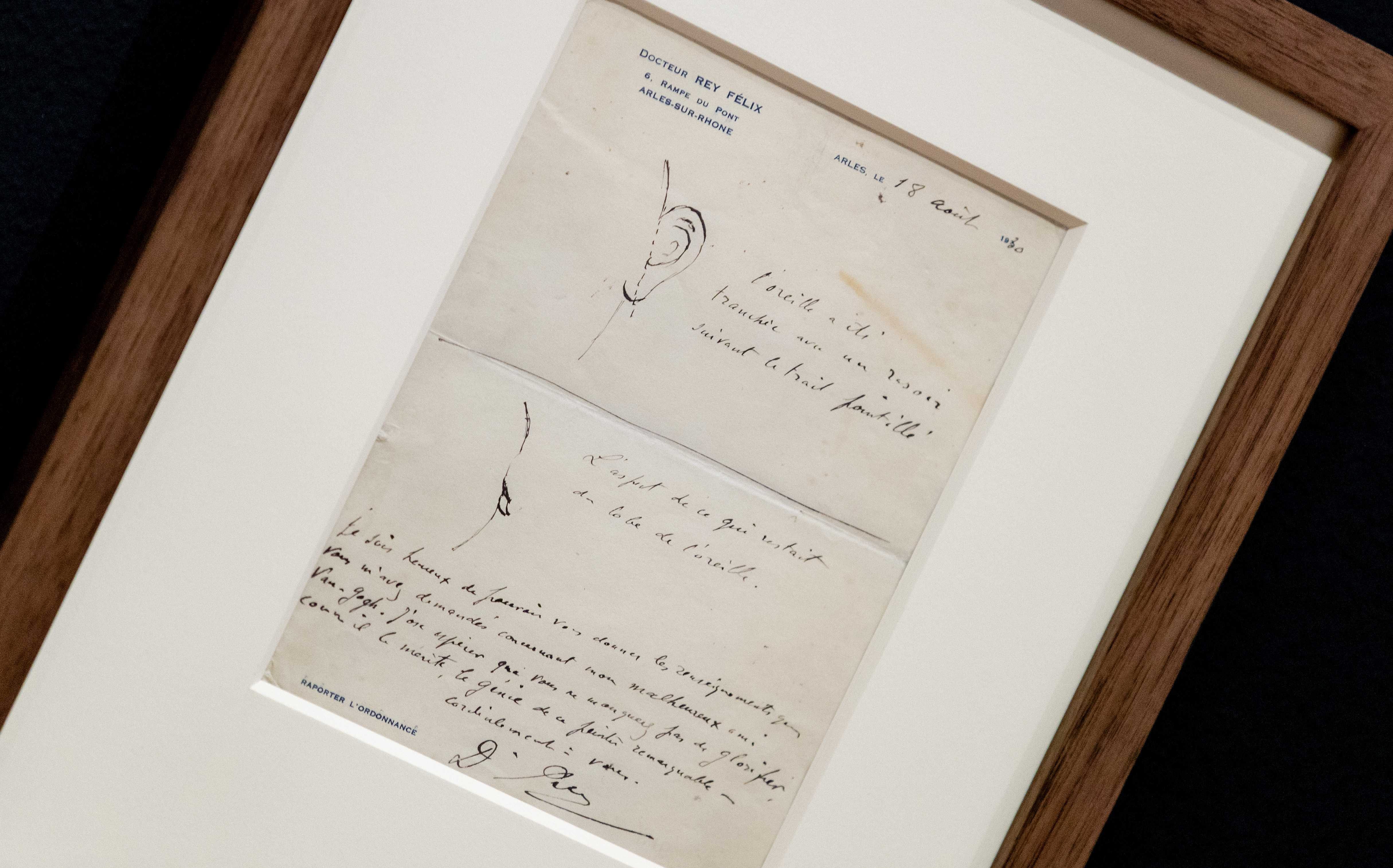 A close-up view of the letter by Dr. Felix Rey about the ear of Vincent van Gogh is displayed as part of the exhibition 'On the Verge of Insanity: Van Gogh and his illness' at The Van Gogh Museum in Amsterdam, The Netherlands. Photo by Robin Van Lonkhuijsen/EPA 