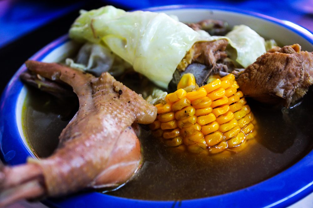 TIME TO EAT. Native chicken in clear soup with corn and cabbage. Photo by Glen Santillan 
