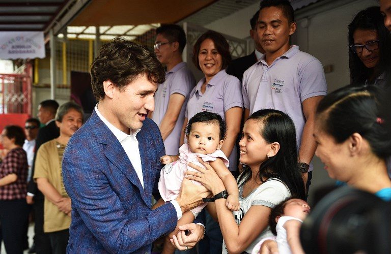 LOOK: Justin Trudeau stops by Jollibee, advocacy center in Manila