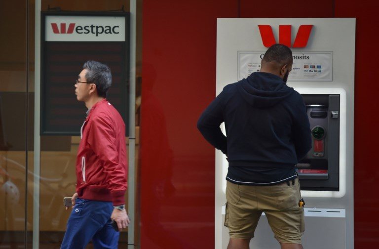 Australia calls banking inquiry to quell public anger