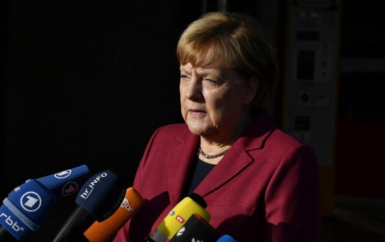 Merkel quells party rebellion ahead of coalition deal vote