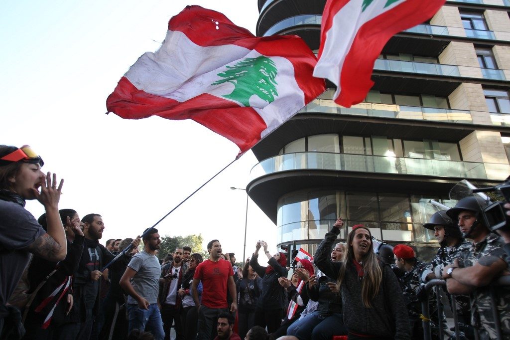 Besieged by protesters, Lebanon assembly postpones session