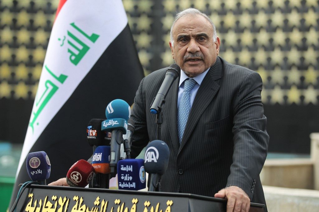 MOURNING. In this file photo, Iraq's Prime Minister Adel Abdel Mahdi speaks during a symbolic funeral ceremony in Baghdad on October 23, 2019. Photo by Ahmad Al-Rubaye/AFP 