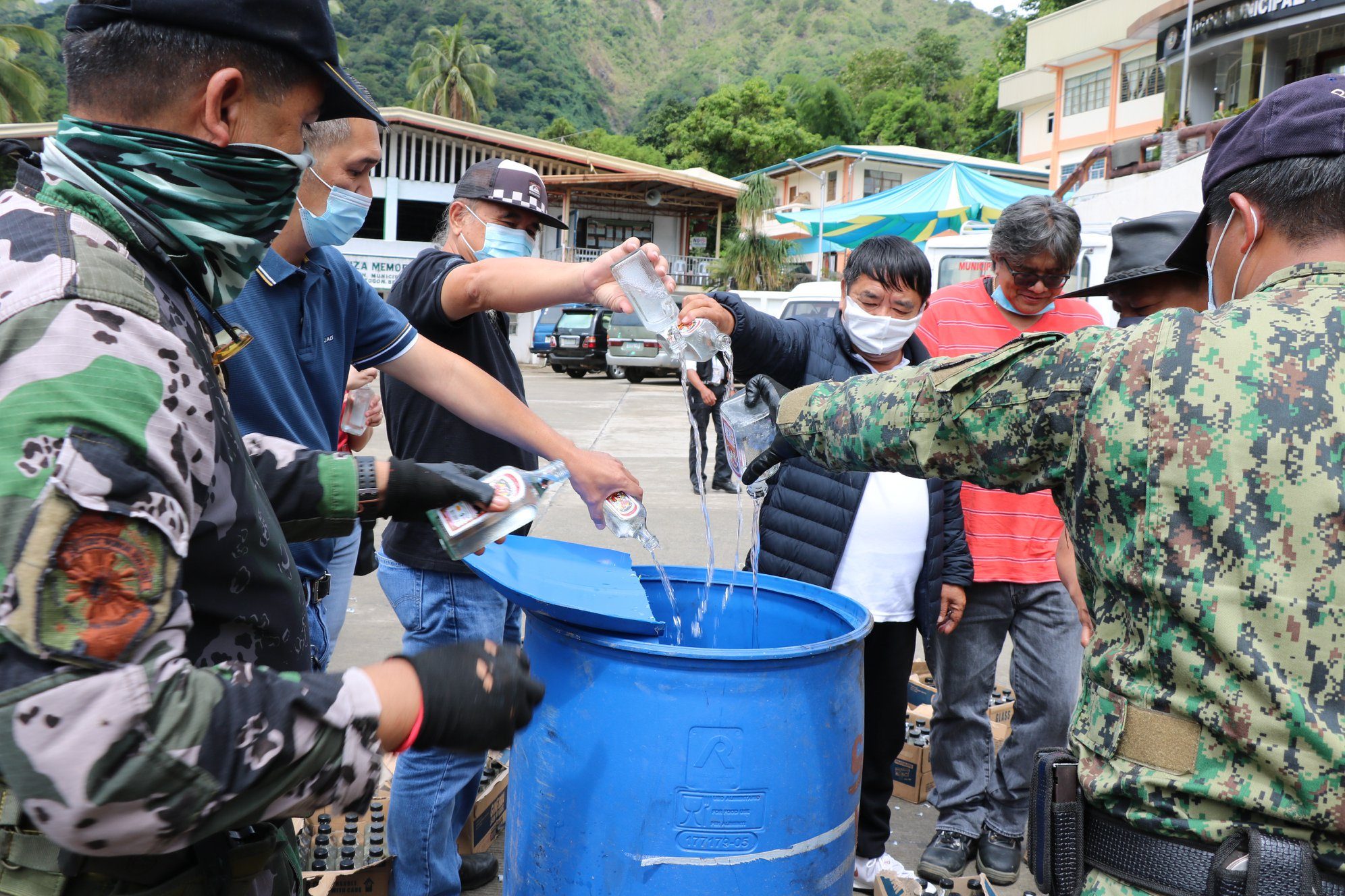 Benguet town mayor uses seized gin as road disinfectant