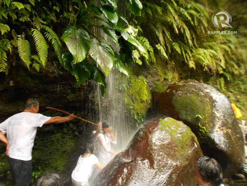 CLEANSING. Pilgrims usually bathe in Banahaw’s flowing waters for a ritual cleansing. Photo by Glenn Martinez 