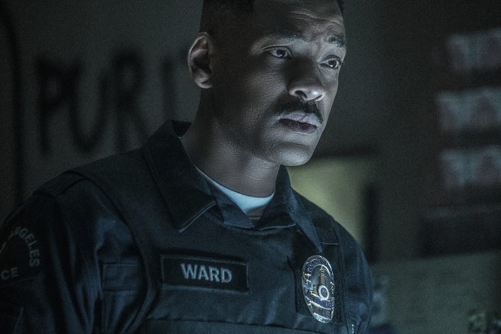 HUMAN. Will Smith plays a cop whose orc partner is being discriminated against in the police force. Photo by Scott Garfield/Netflix 