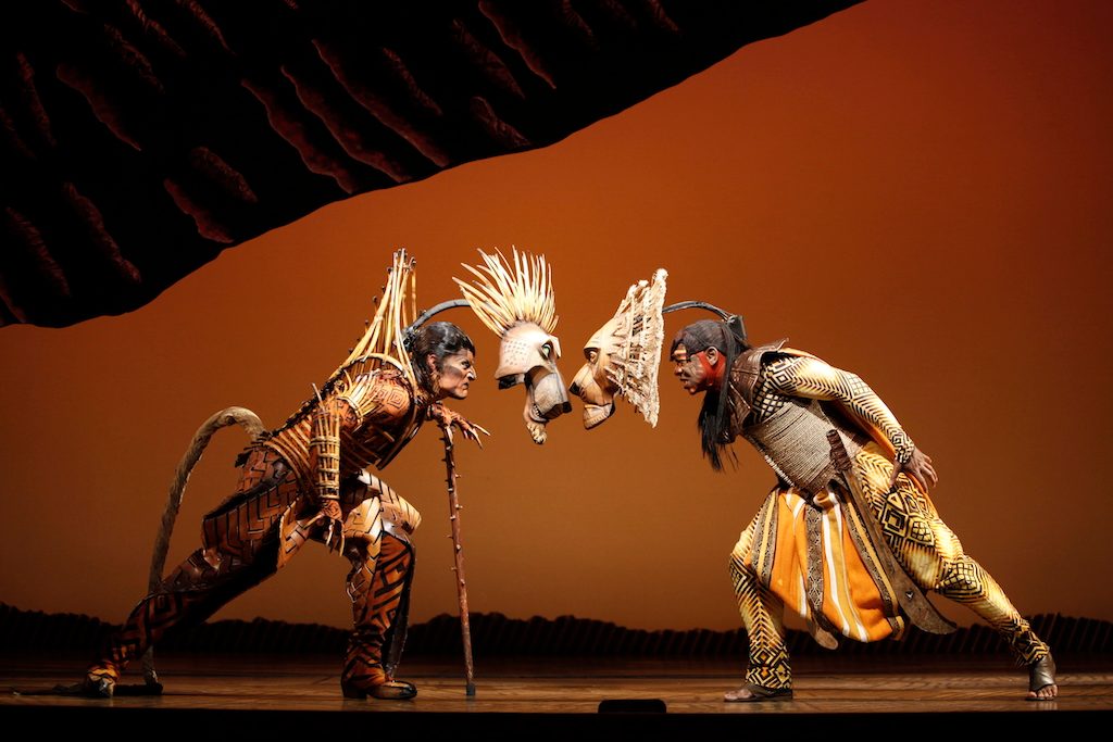 MUFASA AND SCAR. The intricate costumes allow the actors to fully embody the ferocity of lions. Photo by Joan Marcus/Disney 