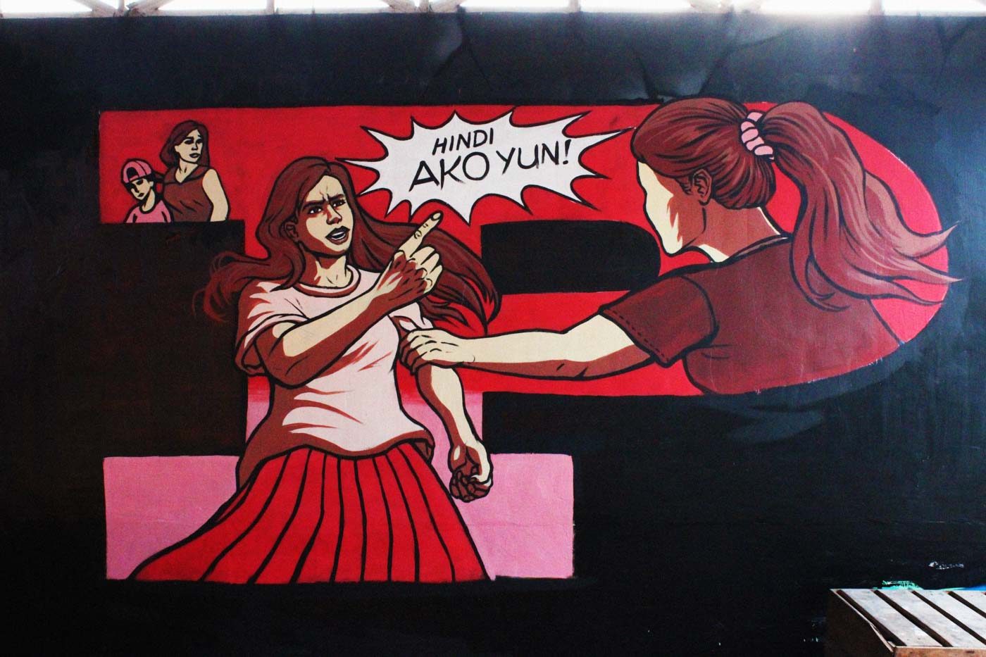 MISTAKEN. This mural, painted by local residents and street artists in Quezon City, shows Irene shaking in anger when she was mistaken for her sister-in-law who is on the drug watchlist. Street art by Gerilya 