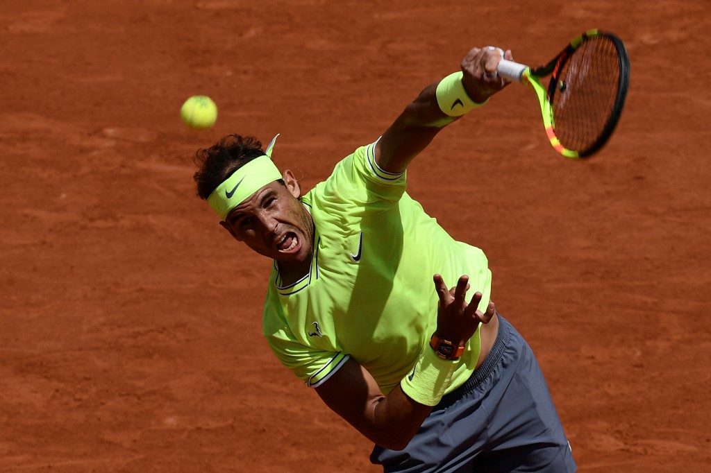 Nadal powers on in Paris, Tsitsipas battles through