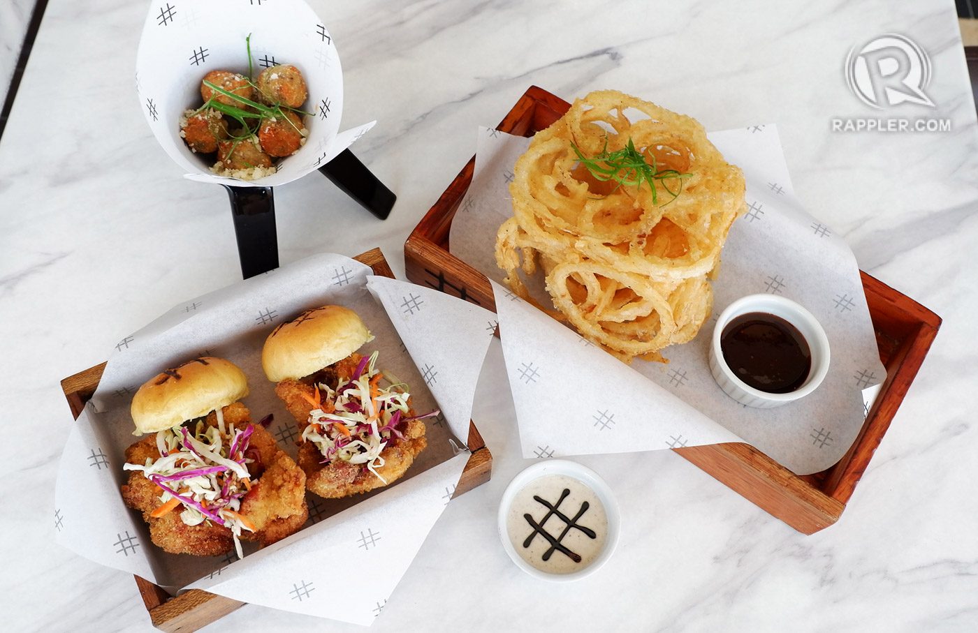 #YUM. The truffle risotto tater tots, T.E. crispy chicken sliders and onion cube are a perfect match. 