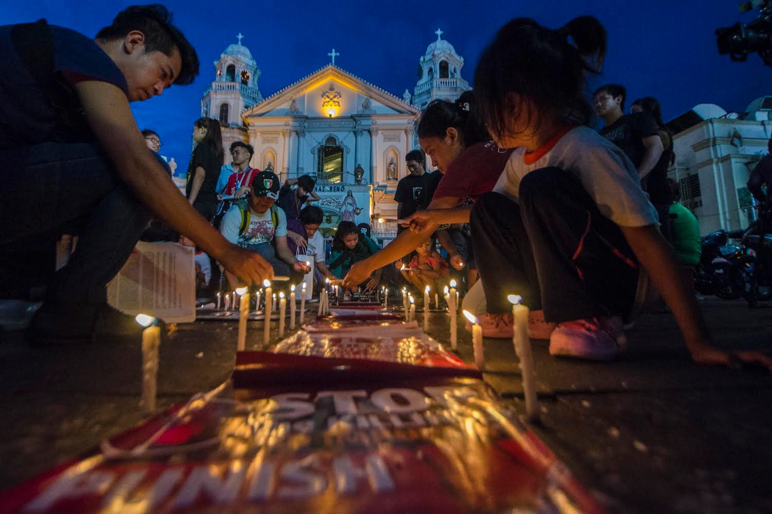 Church protests killings as Philippines honors the dead