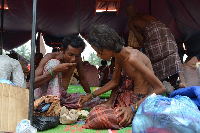 Food aid suspended as Myanmar state sinks deeper into violence