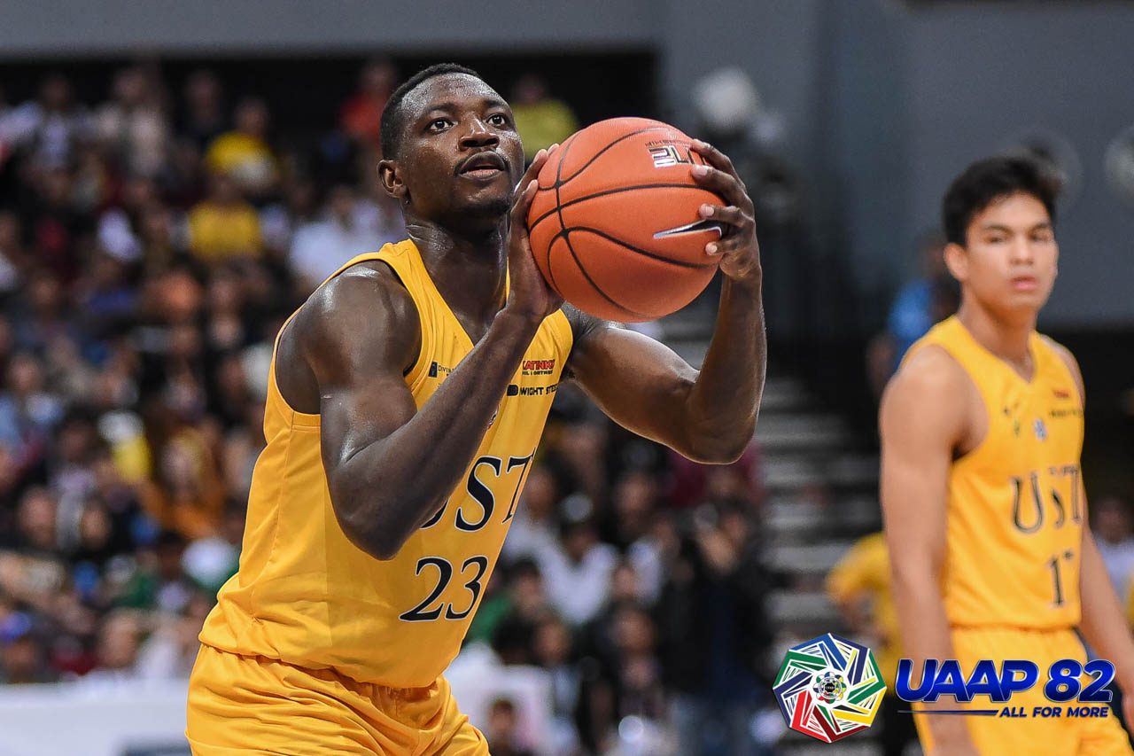 NOT ENOUGH. Soulemane Chabi Yo's double-double effort of 17 points and 15 rebounds for UST goes to waste. Photo release   