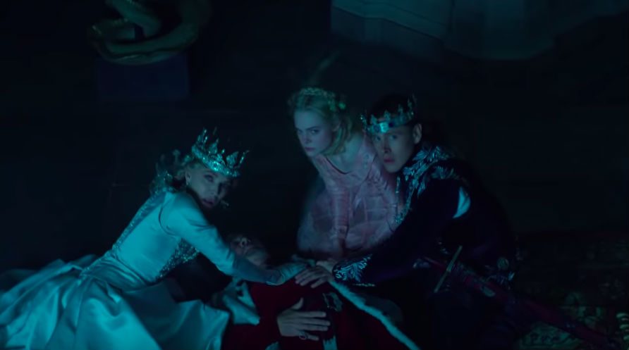 PROTECTION. Aurora and her family protect her father after an argument with Maleficent. 