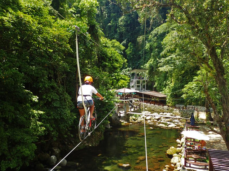ZIPBIKING. This is similar to and is exciting like ziplining, except that you ride on a bike. Photo taken at Panicuason Hot Springs, Naga City 