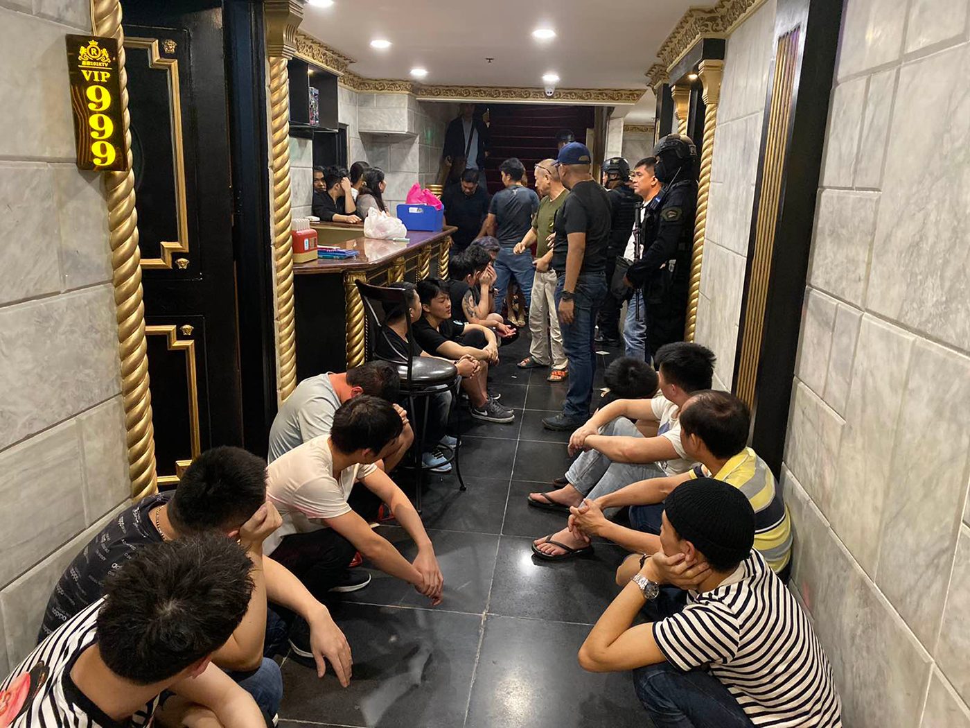 Police arrest 16 foreigners in raid of hotel penthouse used for prostitution