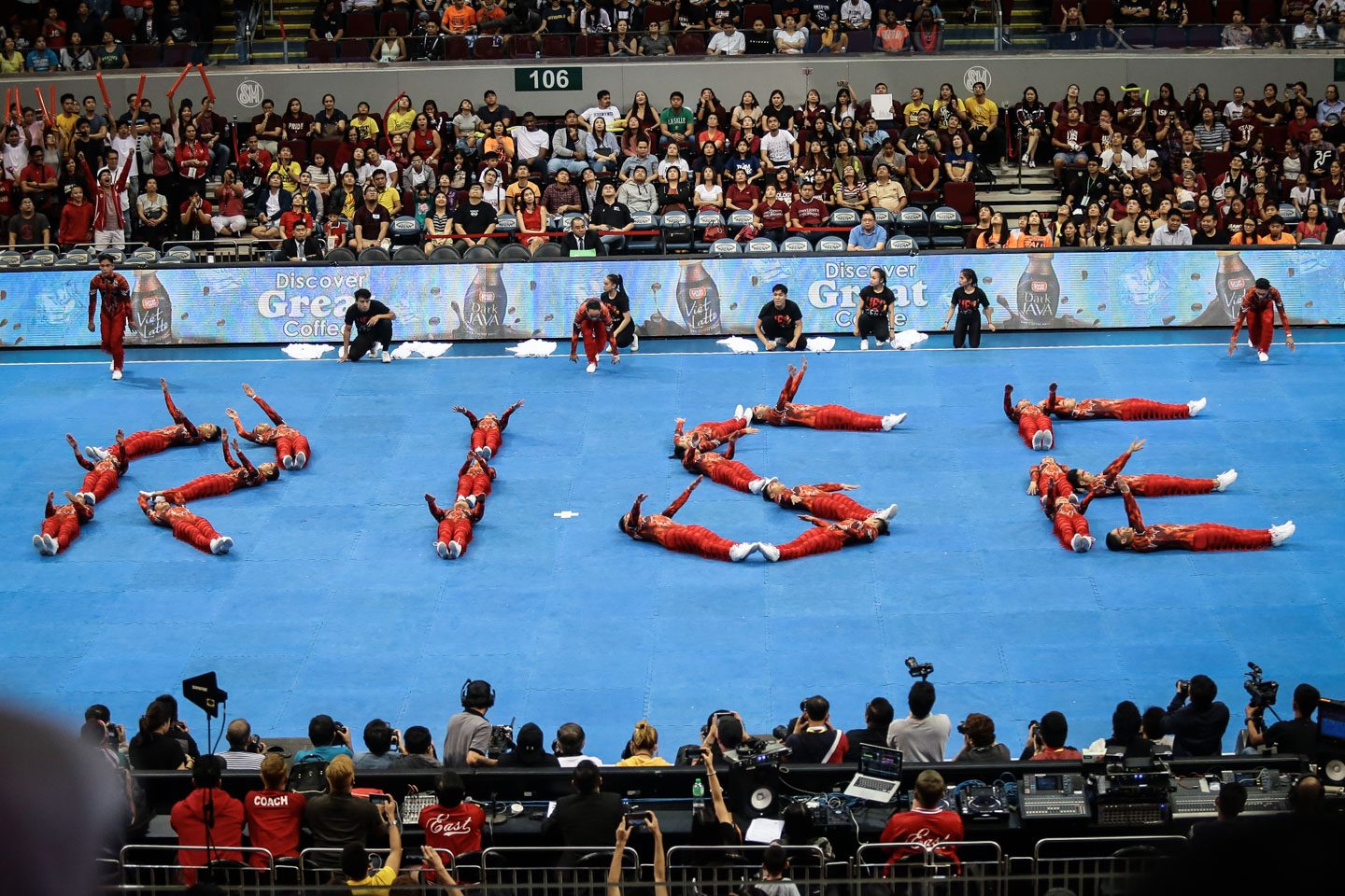 RISE. The UE Pep Squad wants everyone to know that the Red Warriors are on the rise to greatness. Photo by Josh Albelda/Rappler  