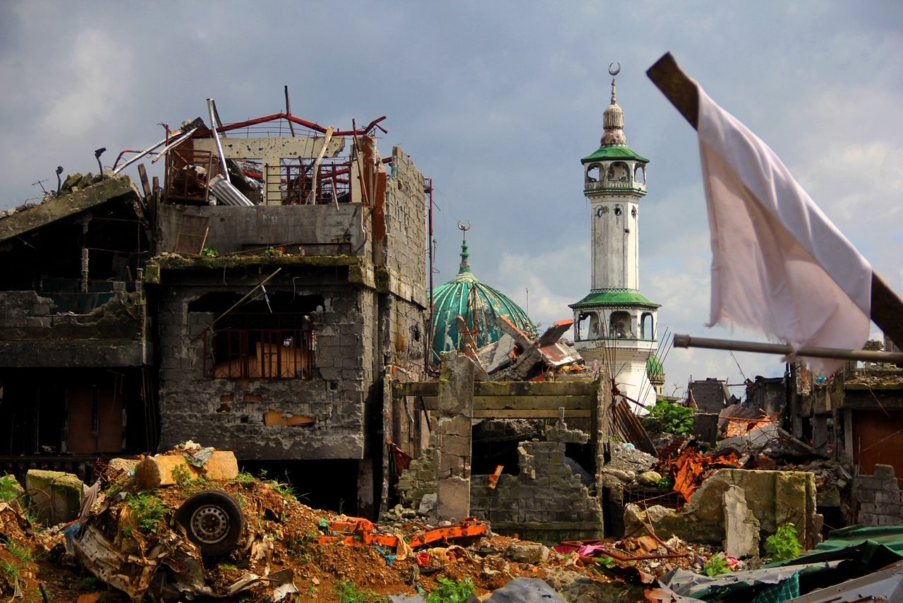 RUINS. A house fronting the village mosque ruined by the siege in Brgy. Barrio Naga. Photo by McMorrie Bidara 