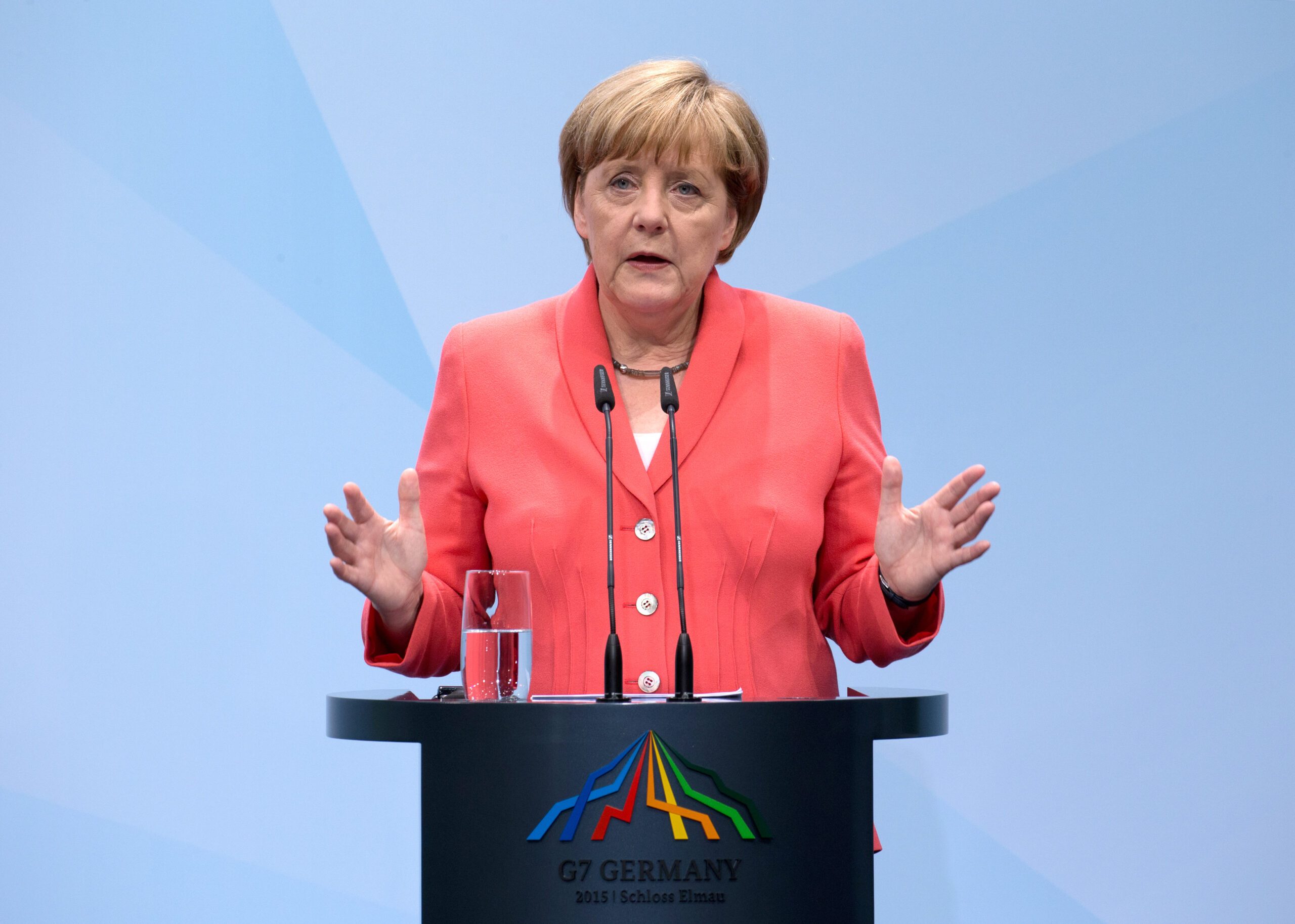 Epa Merke Merkel tells Putin to 'use influence' to rein in Ukraine rebels