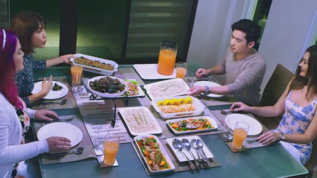MEET THE FAMILY. Calix introduces Val to his family during dinner  