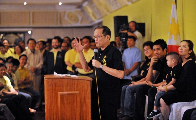 WITH FAMILY. The senator and his family, wear black during the announcement in Club Filipino. File photo by Ted Aljibe/AFP  