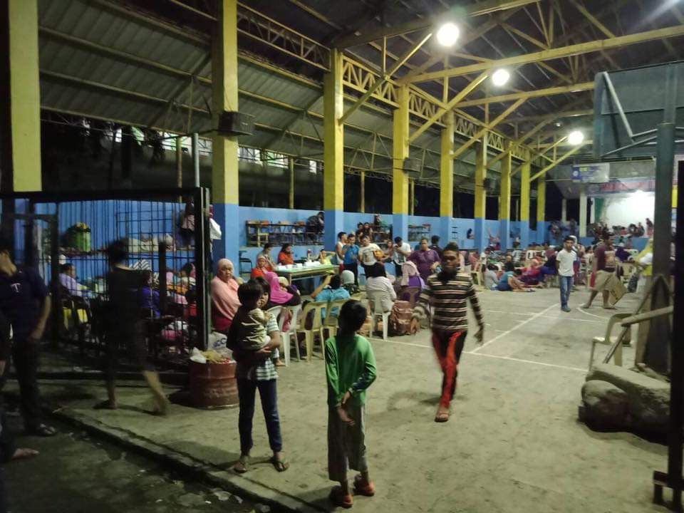 TEMPORARY SHELTER. Evacuees gather at the Ma-a gym. Photo from Davao CIO 