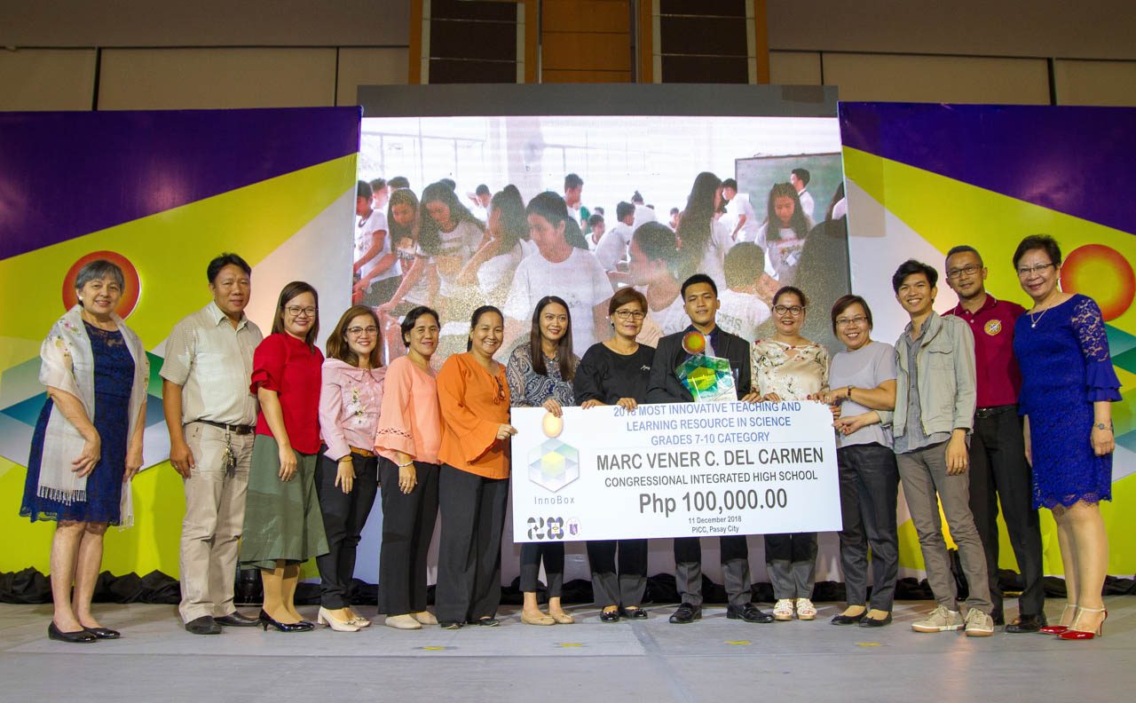 DOST Undersecretary for S&T Services Dr. Carol Yorobe (rightmost), and DOST-SEI Director Dr. Josette Biyo (leftmost) with one of the winners of the 1st InnoBox competition, Marc Vener Del Carmen of Congressional Integrated High School, Dasmariñas, Cavite. Photo from DOST-SEI 