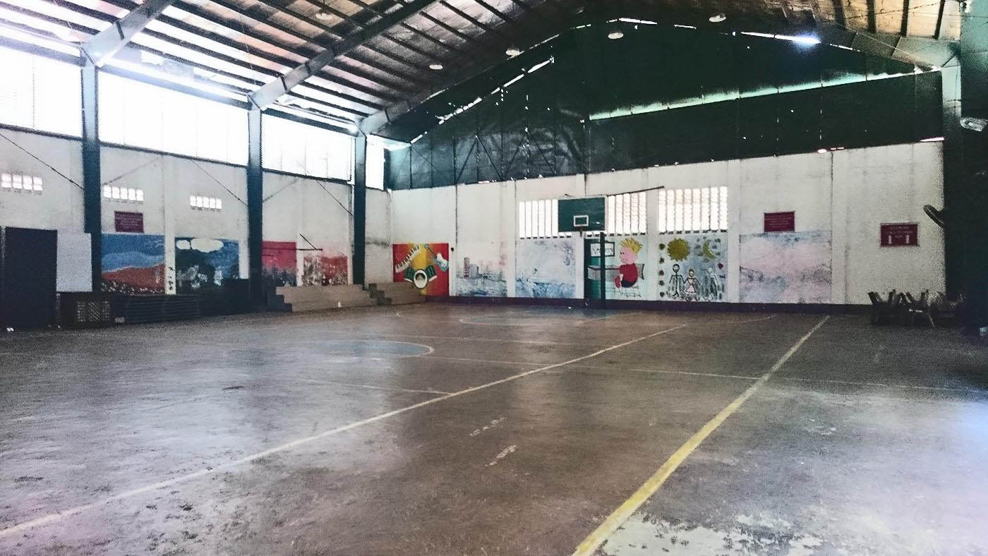 EMPTY INSIDE. The rehabilitation center's basketball court with murals painted by the trainees. 