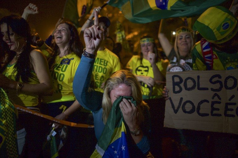 BOLSONARO WINS. Supporters of far-right lawmaker and presidential candidate for the Social Liberal Party (PSL), Jair Bolsonaro, celebrate the election in Rio de Janeiro, Brazil, on October 28, 2018. Photo by Mauro Pimentel/AFP 