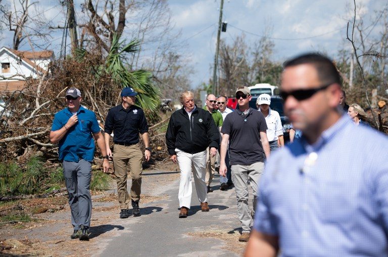 Trump questions climate change during hurricane damage tour