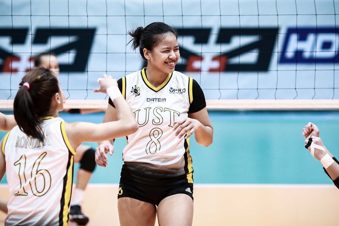 UST cruises past UE, gets share of No. 2 spot