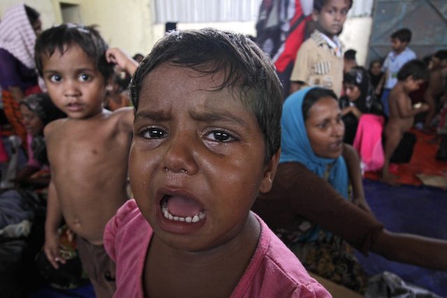 BOAT PEOPLE. A child cries at the refugee camp for Rohingya and Bangladeshi migrants in Kuala Langsa, Aceh, on May 15, 2015. Photo by Jun Ha/EPA  