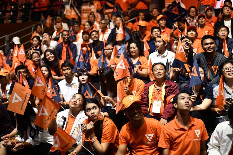 SUPPORTERS Future Forward Party supporters listen during the party leader Thanathorn Juangroongruangkit's final major campaign rally in Bangkok on March 22, 2019, ahead of the March 24 general election. Photo by Jewel Samad/AFP 