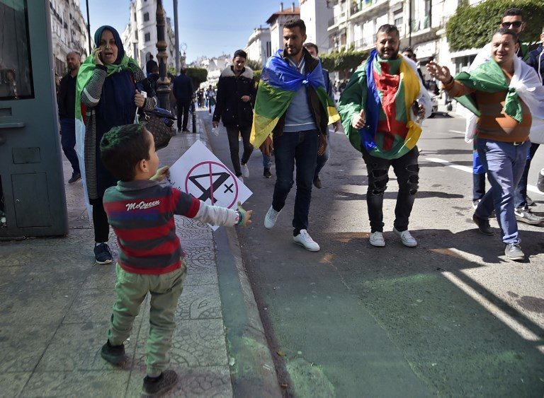 Thousands of Algerians protest despite Bouteflika vow not to run