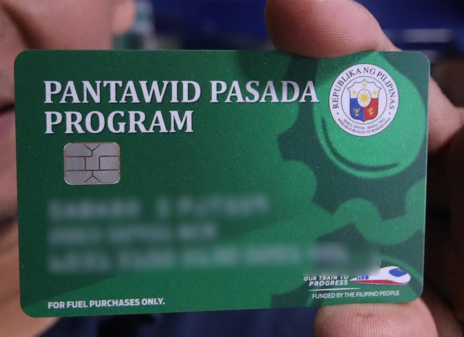 CLOSE UP. The card (details blurred) bears the complete name of the franchise holder, plate number of the PUJ, region where the franchise was registered, and the card number. Photo by Darren Langit/Rappler  