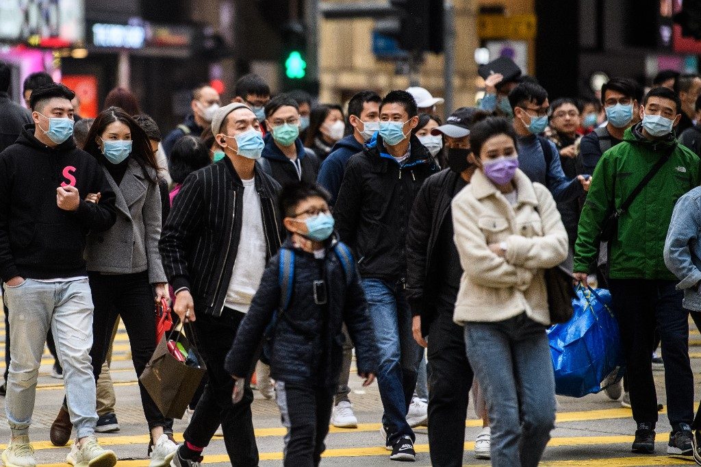 Virus fears spark mask queues and empty shelves in Hong Kong