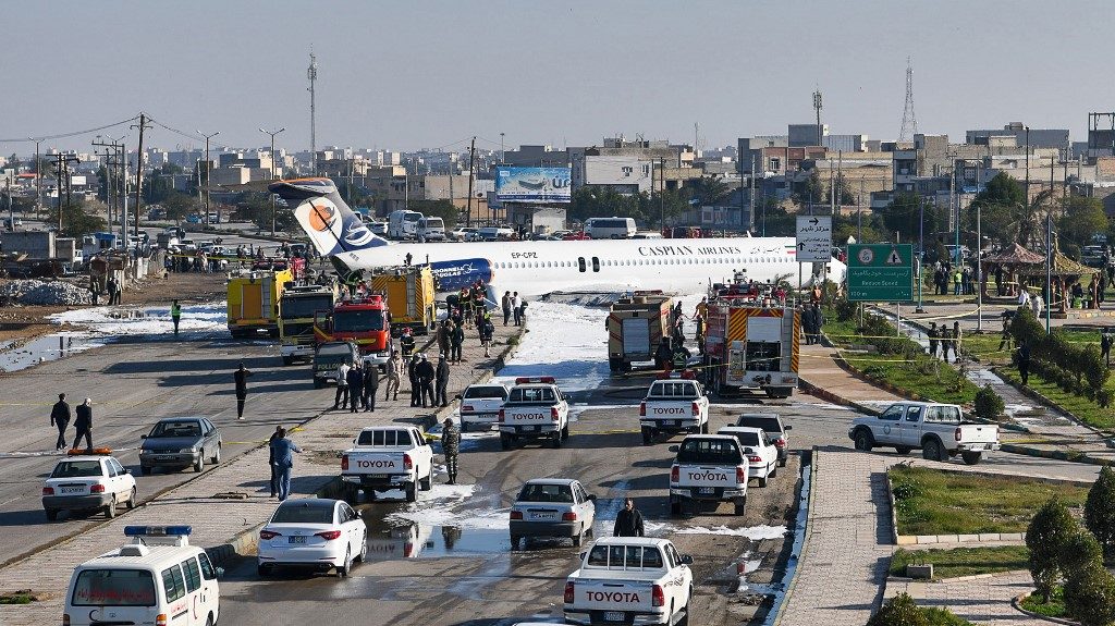Iran airliner overshoots runway, stops in highway