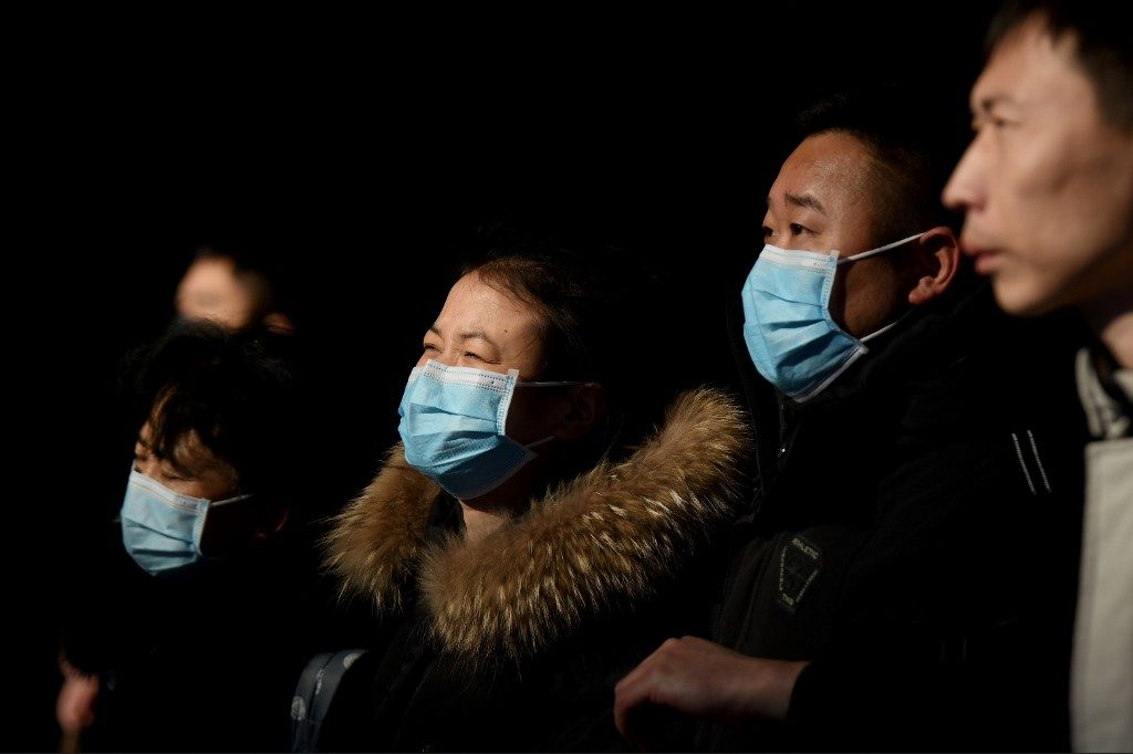 WHO still probing if China virus can spread before symptoms
