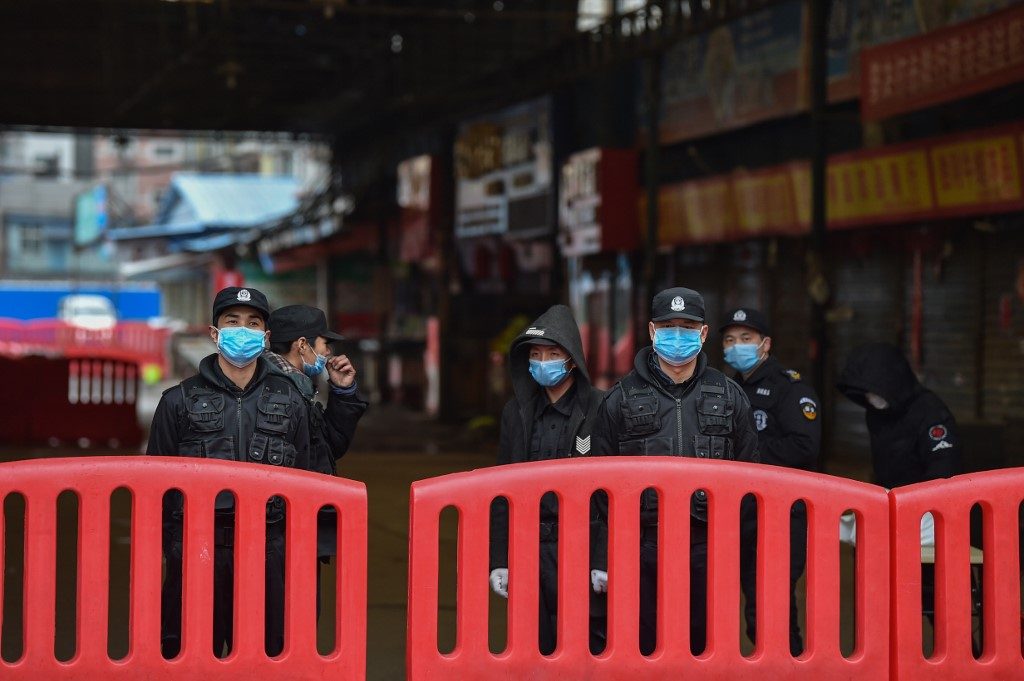 China flies citizens home to virus-hit Wuhan