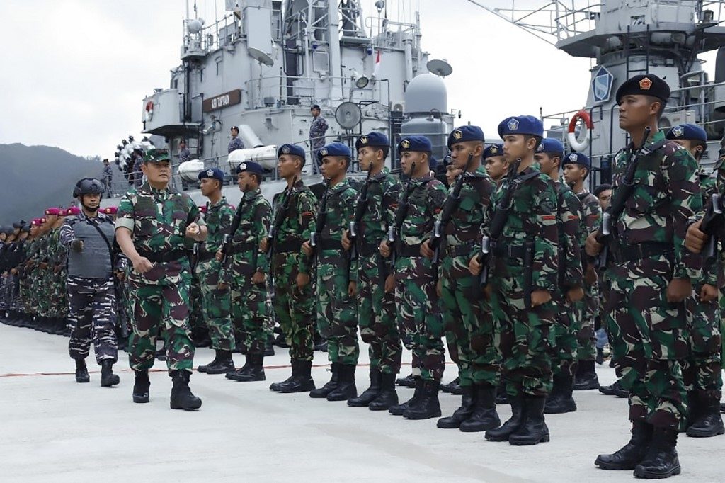 Indonesia deploys fighter jets, warships to disputed waters in China spat